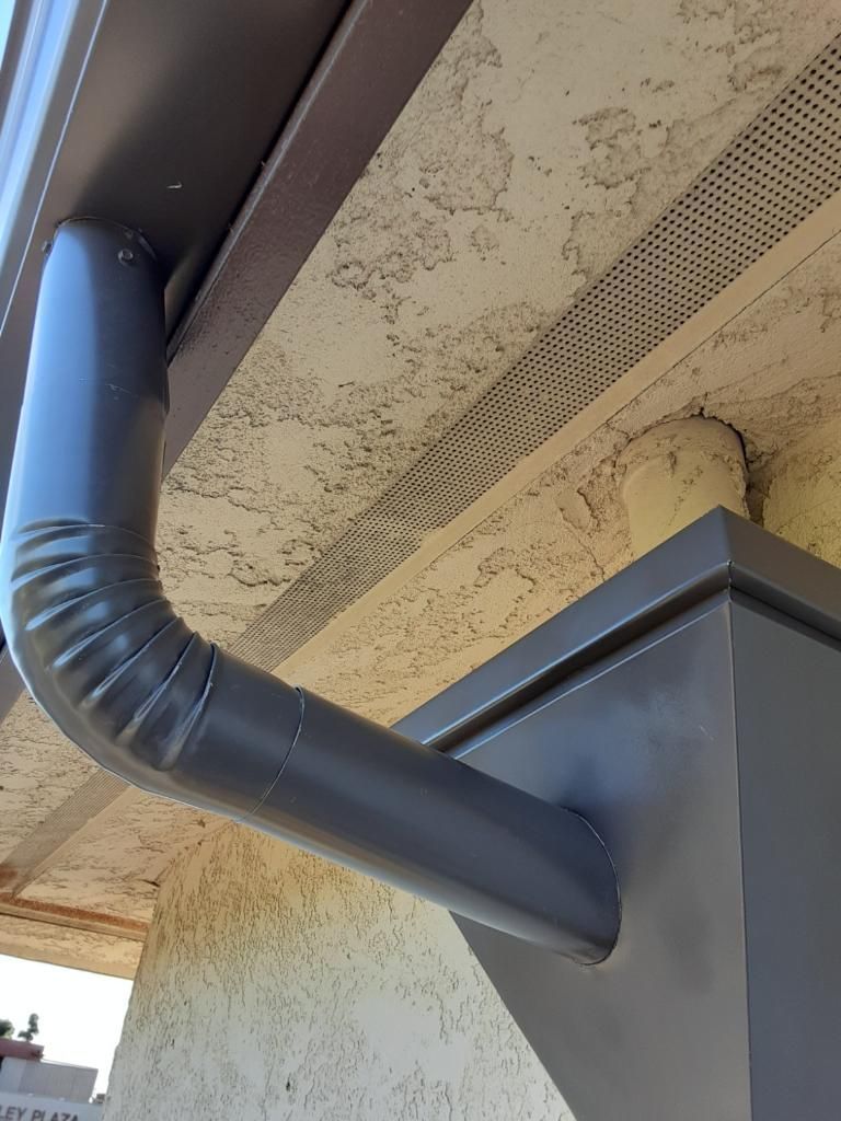 Seamless gutter system earlier view